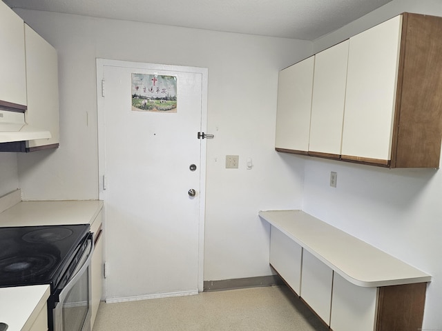 508 Oak Ave Apt 7, Cheshire, CT 06410 - kitchen with stainless steel electric stove, light countertops, and white cabinets