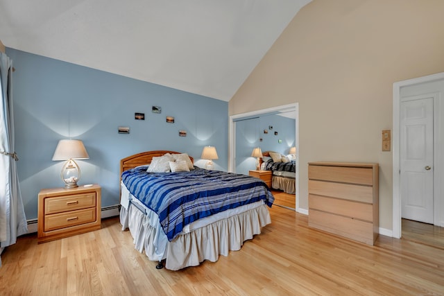 114 Tiffany Ln, Bristol, CT 06010 - bedroom with light wood-type flooring, high vaulted ceiling, a baseboard heating unit, and a closet