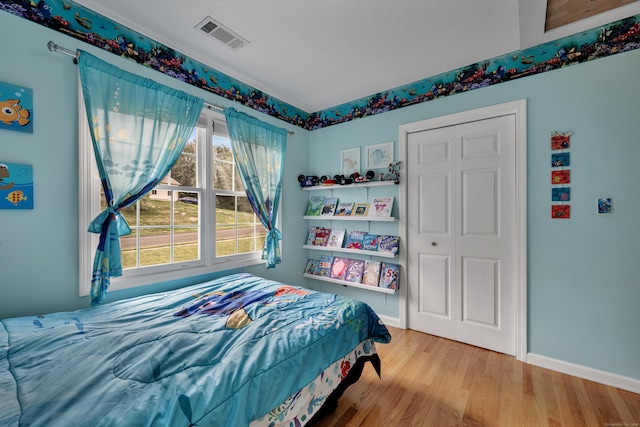 114 Tiffany Ln, Bristol, CT 06010 - bedroom with wood finished floors and baseboards
