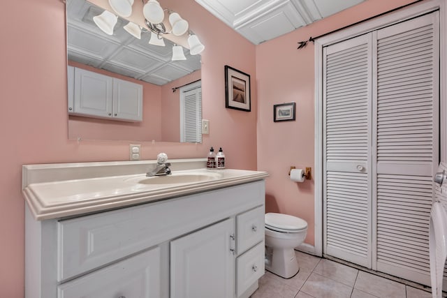 114 Tiffany Ln, Bristol, CT 06010 - bathroom featuring a closet, vanity, tile patterned flooring, and an ornate ceiling