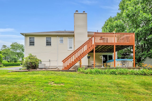 114 Tiffany Ln, Bristol, CT 06010 - back of house with a wooden deck, stairs, a yard, and a chimney