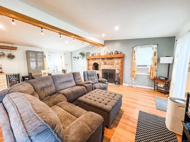 64 Spaulding Rd, Plainfield, CT 06374 - living area with wine cooler, light wood finished floors, recessed lighting, a stone fireplace, and rail lighting