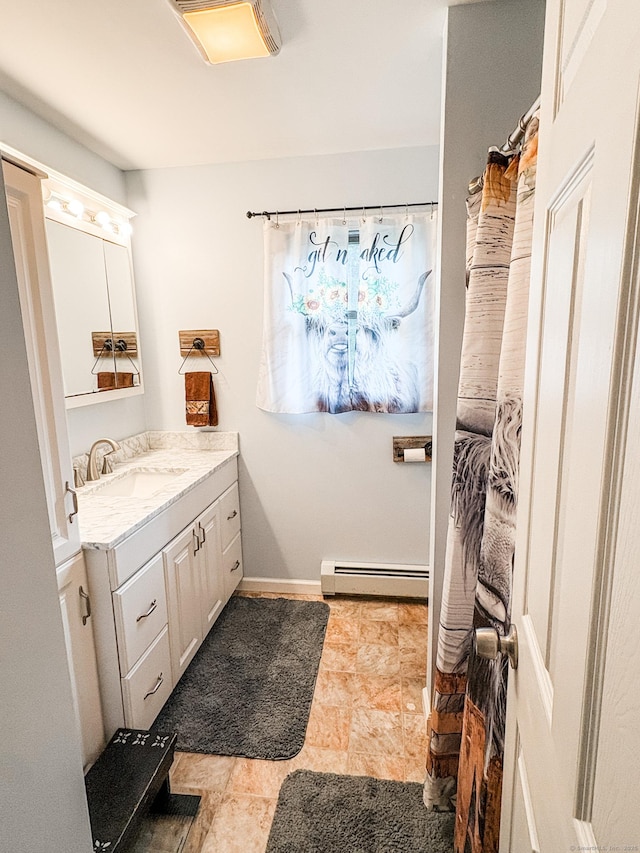 64 Spaulding Rd, Plainfield, CT 06374 - full bathroom with baseboard heating and vanity