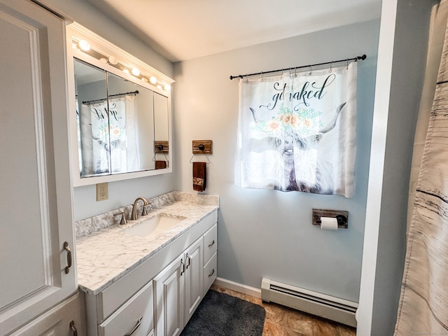 64 Spaulding Rd, Plainfield, CT 06374 - bathroom with baseboard heating and vanity