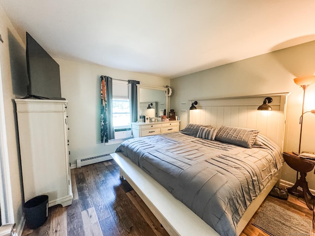 64 Spaulding Rd, Plainfield, CT 06374 - bedroom with a baseboard heating unit and dark wood-style flooring