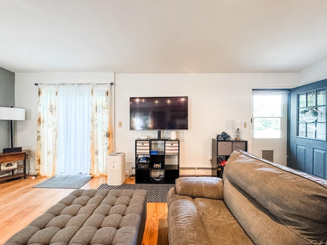 64 Spaulding Rd, Plainfield, CT 06374 - living room featuring wood finished floors and a baseboard radiator