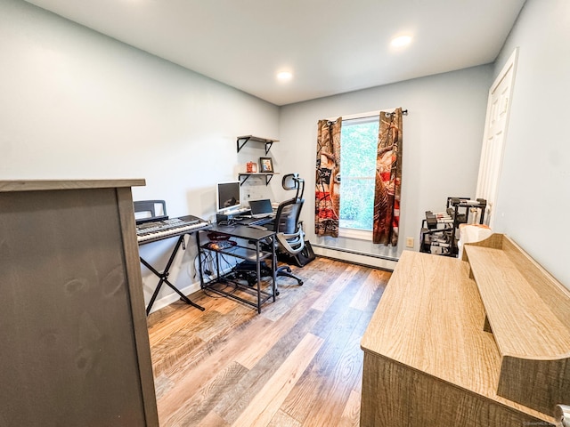 64 Spaulding Rd, Plainfield, CT 06374 - office space featuring wood finished floors, a baseboard radiator, and recessed lighting