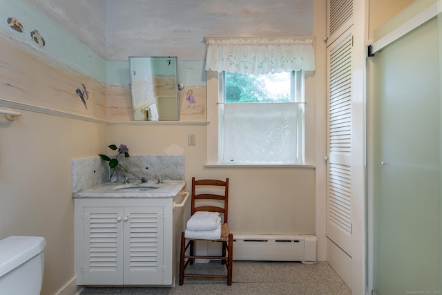 240 Main St, Salisbury, CT 06068 - half bath with a baseboard radiator and vanity