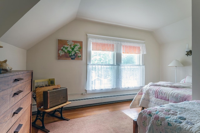 240 Main St, Salisbury, CT 06068 - bedroom featuring a baseboard heating unit, lofted ceiling, and wood finished floors