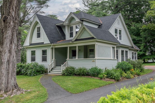 240 Main St, Salisbury, CT 06068 - view of front of property with covered porch, roof with shingles, and a front yard