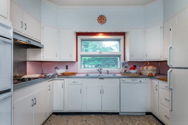240 Main St, Salisbury, CT 06068 - kitchen with white appliances, under cabinet range hood, white cabinets, and crown molding