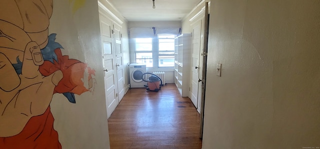 173 Fairview Ave, Bridgeport, CT 06606 - hallway with light wood-style flooring, washer / dryer, and radiator