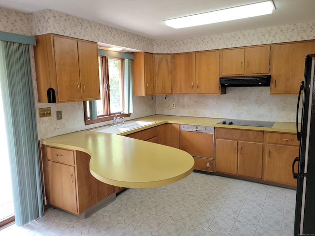 62 Rice Rd, Meriden, CT 06450 - kitchen featuring black appliances, extractor fan, light countertops, wallpapered walls, and light flooring