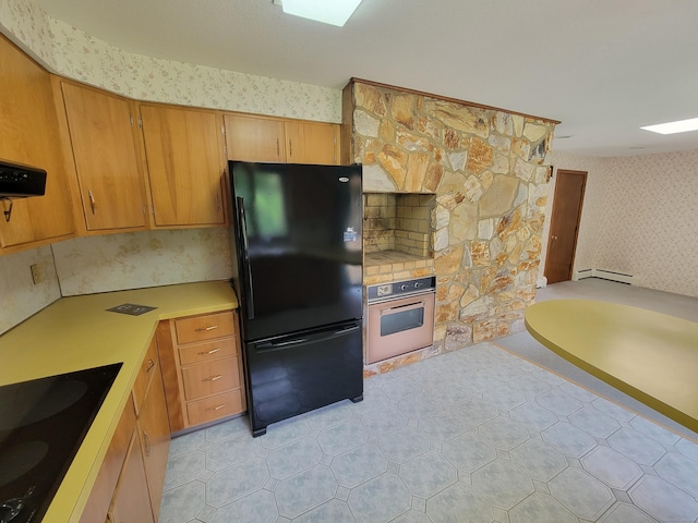 62 Rice Rd, Meriden, CT 06450 - kitchen with black appliances, wallpapered walls, light countertops, extractor fan, and a baseboard radiator