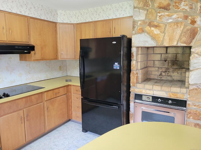 62 Rice Rd, Meriden, CT 06450 - kitchen featuring black appliances, under cabinet range hood, light countertops, wallpapered walls, and light flooring