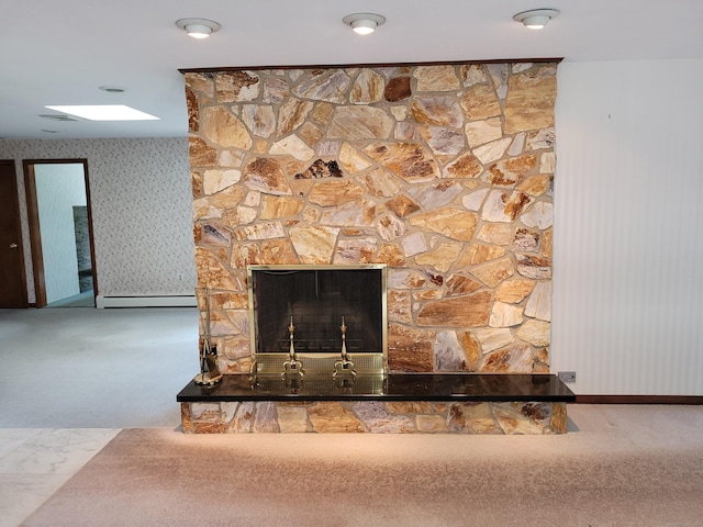 62 Rice Rd, Meriden, CT 06450 - detailed view of carpet floors, a baseboard radiator, wallpapered walls, and a stone fireplace