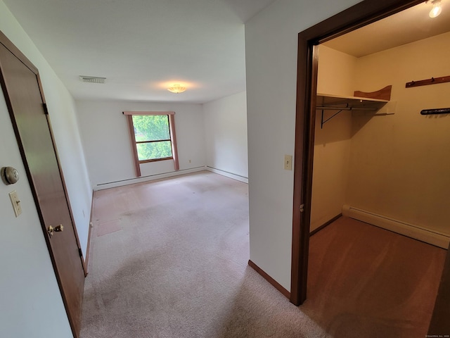 62 Rice Rd, Meriden, CT 06450 - unfurnished bedroom with a baseboard heating unit, carpet, and a spacious closet