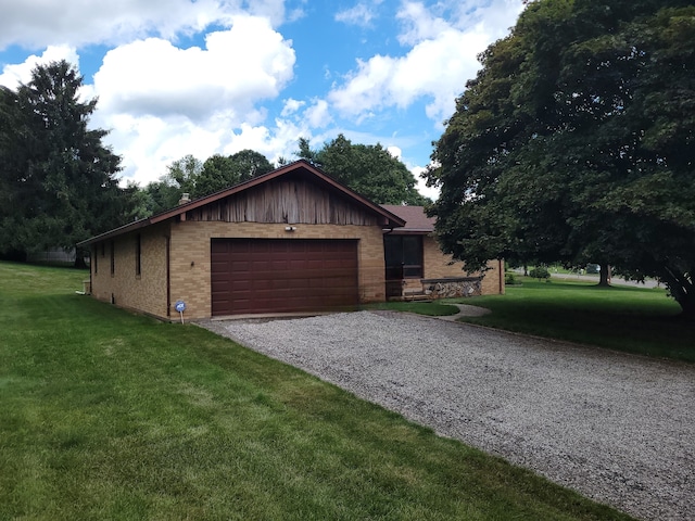 62 Rice Rd, Meriden, CT 06450 - view of front of house with brick siding, gravel driveway, a front lawn, and a garage