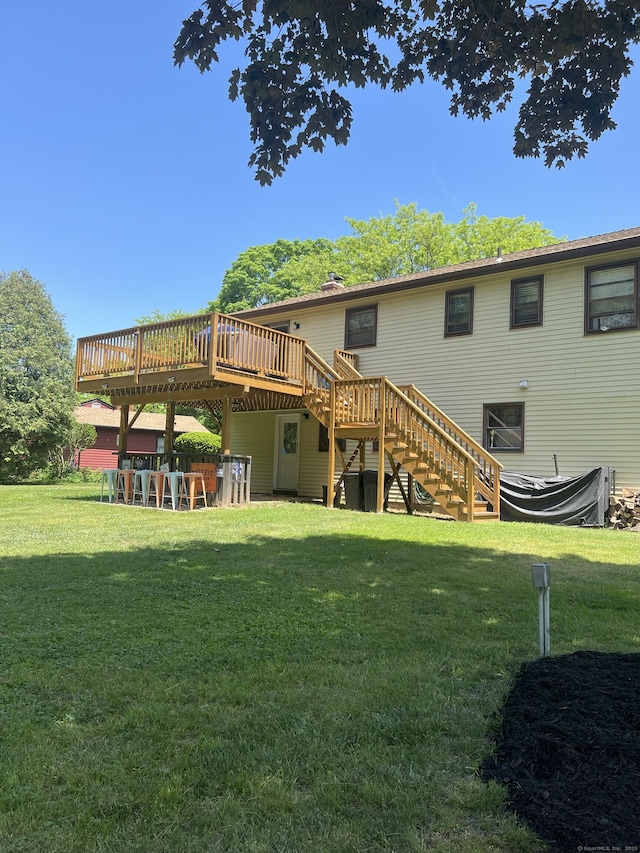 35 Depauw Cir E, Hartford, CT 06108 - rear view of property with stairs, a deck, and a yard