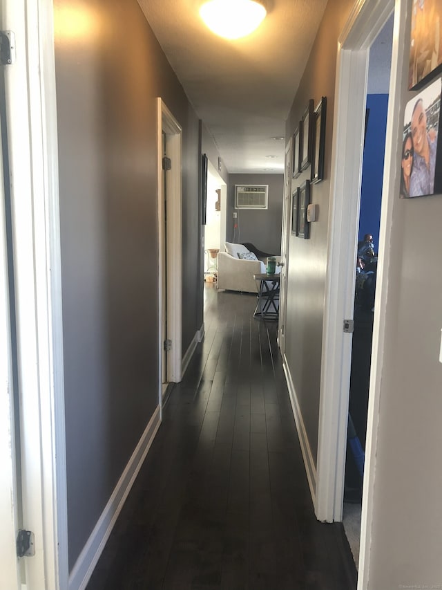 35 Depauw Cir E, Hartford, CT 06108 - corridor with dark wood-type flooring and a wall mounted AC