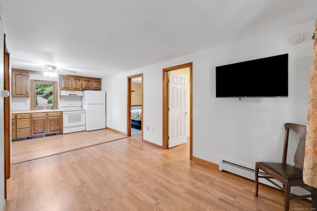 11 Harrington Rd, East Windsor, CT 06016 - unfurnished living room featuring light wood-type flooring, a ceiling fan, and a baseboard radiator
