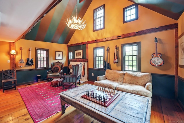 12 Jackson Rd, Killingworth, CT 06419 - living area featuring wood-type flooring, a chandelier, and high vaulted ceiling