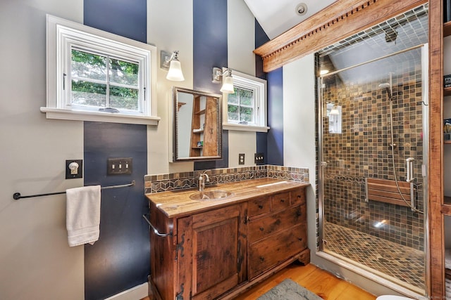 12 Jackson Rd, Killingworth, CT 06419 - bathroom featuring a shower stall, wood finished floors, vanity, and vaulted ceiling