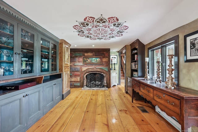 12 Jackson Rd, Killingworth, CT 06419 - interior space featuring a brick fireplace and light wood-style flooring