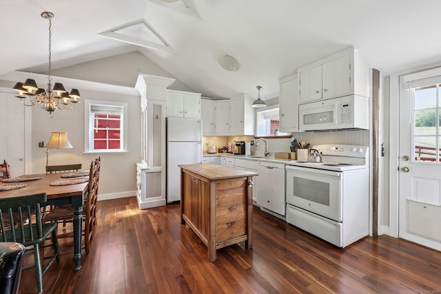 12 Jackson Rd, Killingworth, CT 06419 - kitchen with white appliances, a chandelier, vaulted ceiling, a kitchen island, and white cabinetry