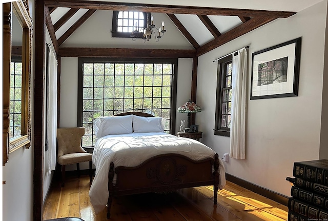 12 Jackson Rd, Killingworth, CT 06419 - bedroom featuring wood-type flooring, a chandelier, and multiple windows