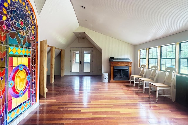 12 Jackson Rd, Killingworth, CT 06419 - living area with vaulted ceiling, wood finished floors, and a fireplace
