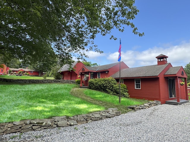 12 Jackson Rd, Killingworth, CT 06419 - view of front of house with a front lawn and a shingled roof