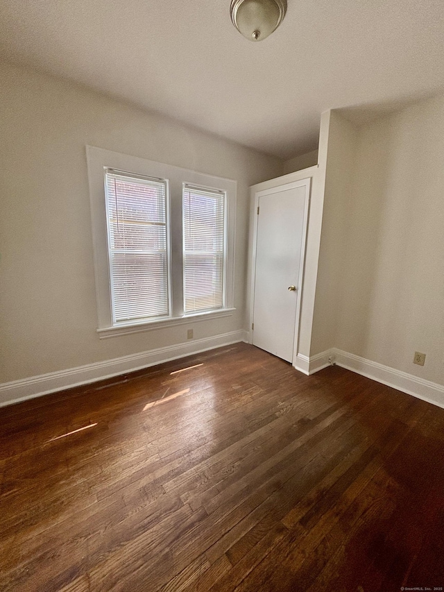 1483 Boston Ave, Bridgeport, CT 06610 - unfurnished room with dark wood-style floors