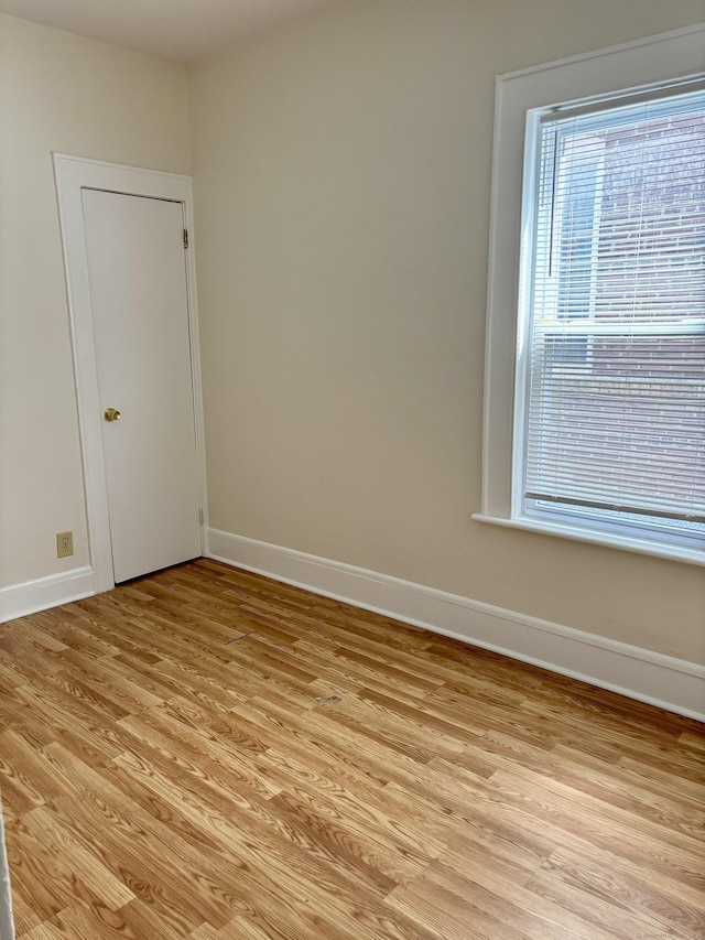 1483 Boston Ave, Bridgeport, CT 06610 - spare room featuring baseboards and light wood-type flooring