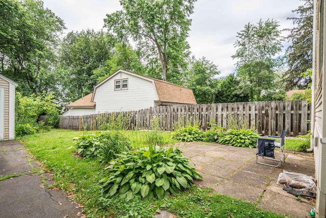 145 Quaker Ln S, West Hartford, CT 06119 - fenced backyard with a patio area