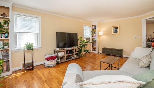 145 Quaker Ln S, West Hartford, CT 06119 - living room featuring crown molding, wood finished floors, and healthy amount of natural light