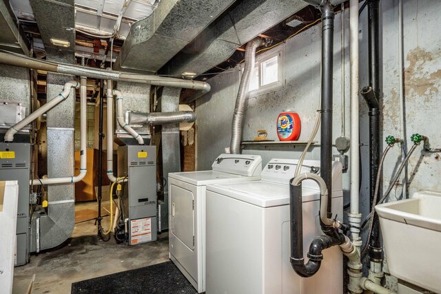 145 Quaker Ln S, West Hartford, CT 06119 - laundry room with washing machine and dryer and heating unit