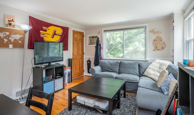145 Quaker Ln S, West Hartford, CT 06119 - living area featuring light wood-style flooring, ornamental molding, and a wall mounted AC