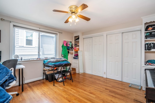 145 Quaker Ln S, West Hartford, CT 06119 - rec room with light wood-style floors and a ceiling fan