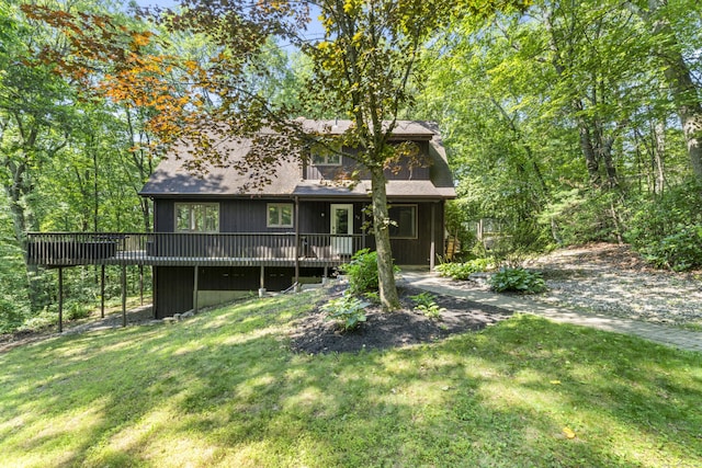 30 W Woods Rd, Burlington, CT 06013 - view of front of property with a front yard, a wooden deck, and roof with shingles