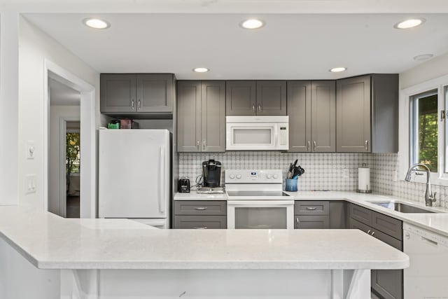 30 W Woods Rd, Burlington, CT 06013 - kitchen featuring white appliances, gray cabinetry, tasteful backsplash, and recessed lighting