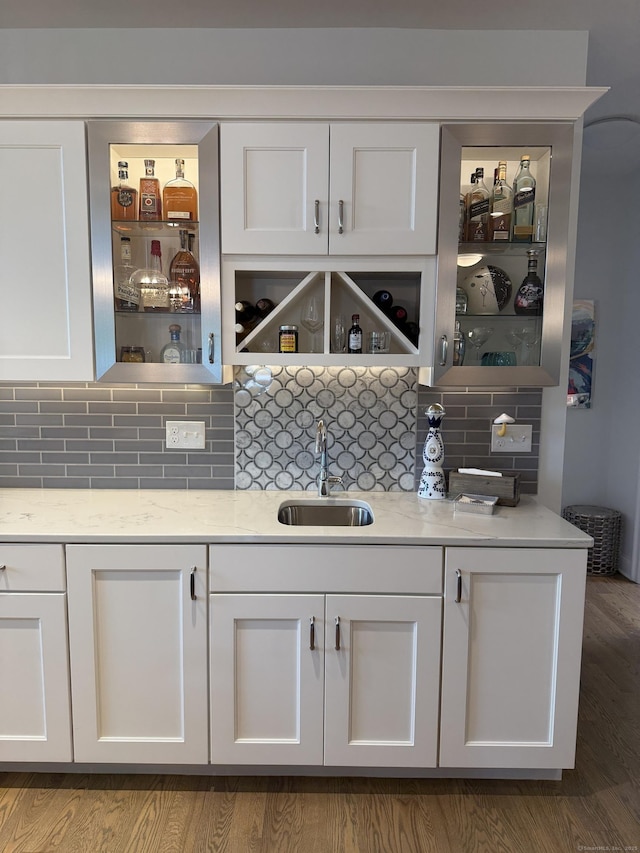 22 Thorson Rd, Oxford, CT 06478 - indoor wet bar featuring backsplash and wood finished floors