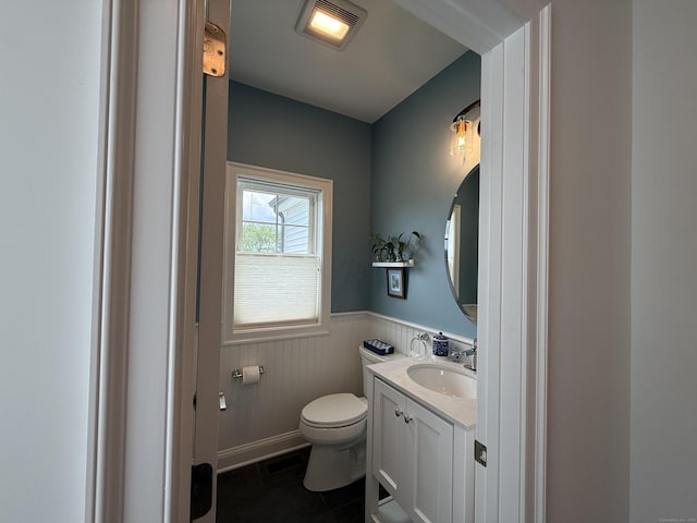22 Thorson Rd, Oxford, CT 06478 - bathroom featuring vanity, wainscoting, and tile patterned floors
