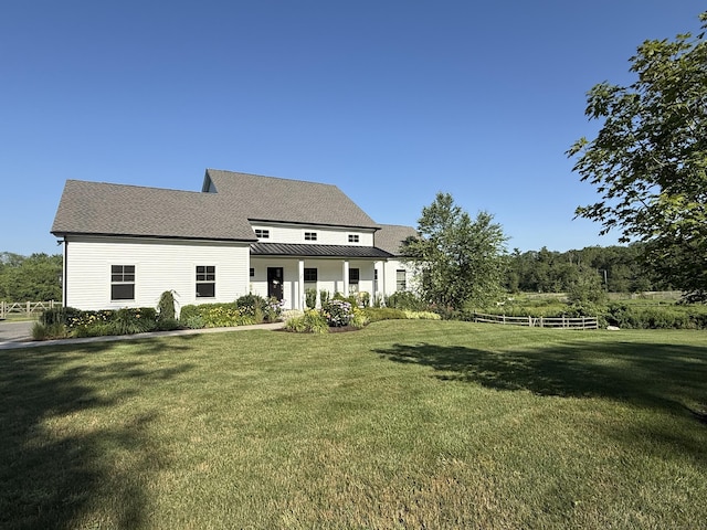 22 Thorson Rd, Oxford, CT 06478 - rear view of property featuring a standing seam roof and a metal roof