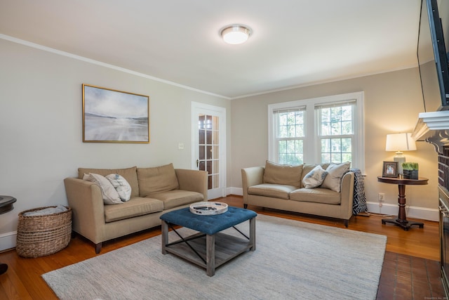 169 Brace Rd, West Hartford, CT 06107 - living area with crown molding, dark wood-style floors, and a fireplace