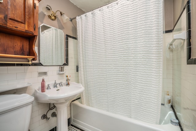 169 Brace Rd, West Hartford, CT 06107 - bathroom with tile walls, shower / bath combo, and decorative backsplash