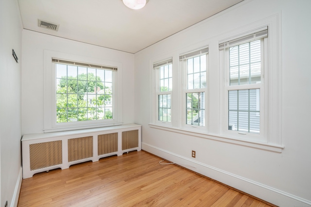 169 Brace Rd, West Hartford, CT 06107 - spare room featuring radiator and light wood finished floors
