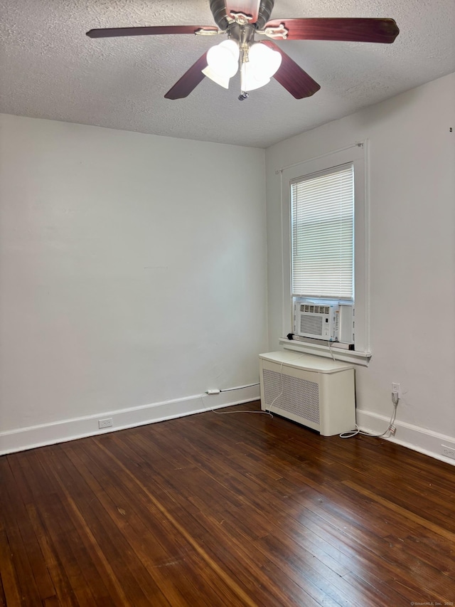 138 Mill Hill Ave, Bridgeport, CT 06610 - spare room featuring hardwood / wood-style flooring, cooling unit, a textured ceiling, a ceiling fan, and radiator heating unit