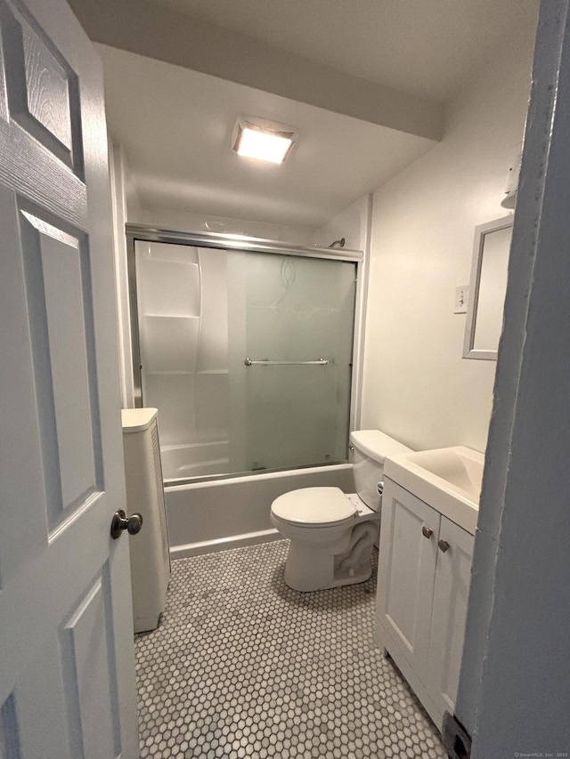 138 Mill Hill Ave, Bridgeport, CT 06610 - full bathroom featuring vanity, enclosed tub / shower combo, and tile patterned flooring