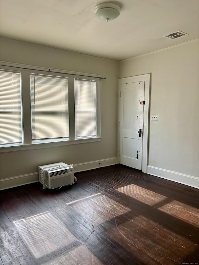 138 Mill Hill Ave, Bridgeport, CT 06610 - foyer with dark wood finished floors and a wall mounted air conditioner